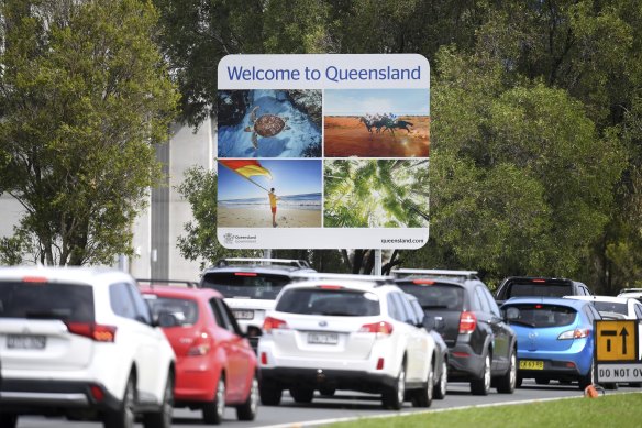 Vehicles from NSW queue on the Pacific Highway trying to enter Queensland during border restrictions in December 2020.