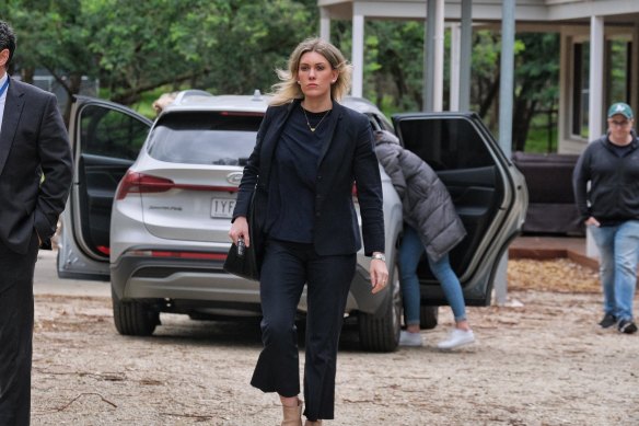 Erin Patterson’s lawyer Ophelia Hollway leaving the property.