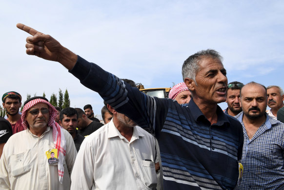 Adnan's father speaks of his fury at the US during his son's funeral.