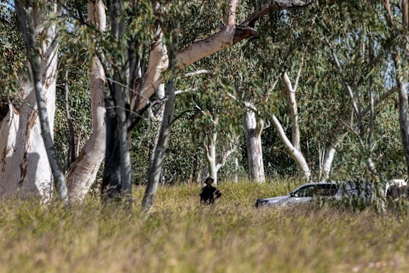 Police at the crime scene where the little girl’s body was found on Thursday. 