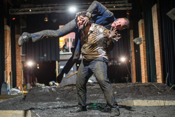 Mud-fighting performers Michael Logo and Vince Crowley in the cancelled 2021 show THIS.