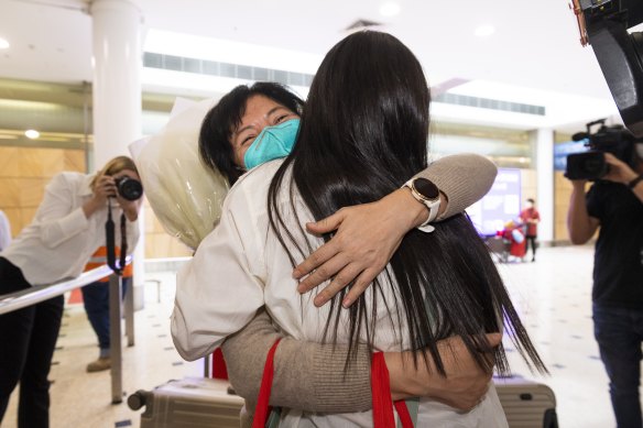 Karen Cao greets her mother Jing in Sydney.