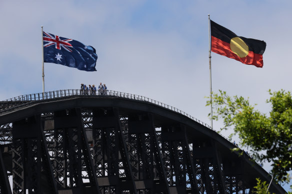 The Aboriginal flag flew alongside the Australian flag on the Sydney Harbour Bridge for the first time on Australia Day of 2013.