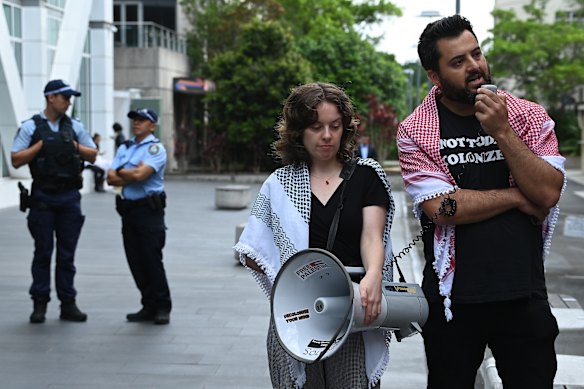 Poet Omar Sakr (right) was among the speakers at a protest outside Creative Australia’s Sydney offices on Thursday.