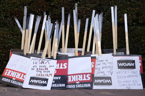 Placards are gathered at the close of a picket outside Walt Disney Studios in May.