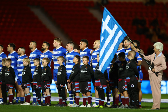 Greek players line up before their World Cup debut.