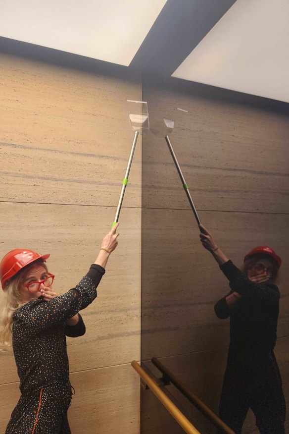 Another SMH colleague with a fear of moths trying to catch one in the lift.