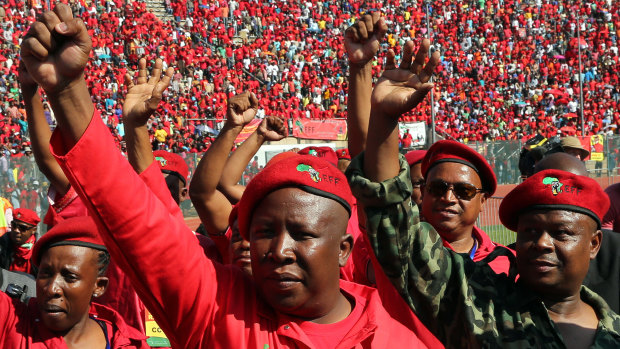 "Time for justice": Julius Malema, leader of South Africa's radical left Economic Freedom Fighters party, centre.