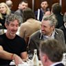 Billionaire tech chief spruiks AI as company he co-founded cuts 150 jobs