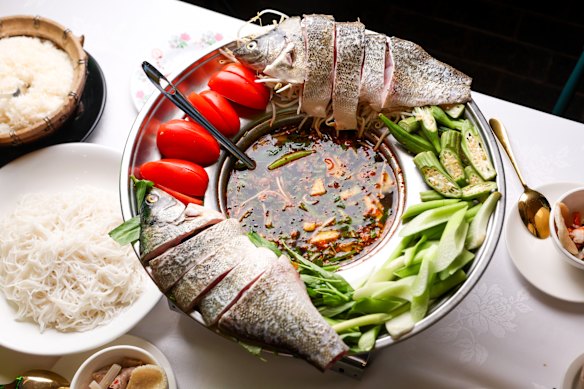 Lau chem tuoi (silver perch with sweet and sour steamboat).