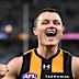 Jack Ginnivan of the Hawks celebrates the win.