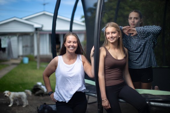 Emily Alston with her daughters Alayna and Lily at home in Colac.