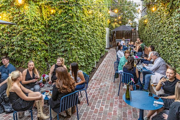 Gracie’s lush courtyard is popular on weekends.