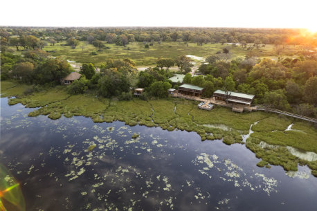 Vumbura Plains camp: Wildlife freely come and go from this lagoon.
