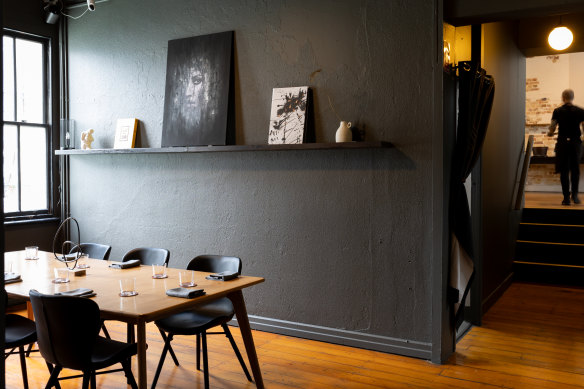 Pneuma’s private dining space is darker and moodier than its light-filled restaurant floor.