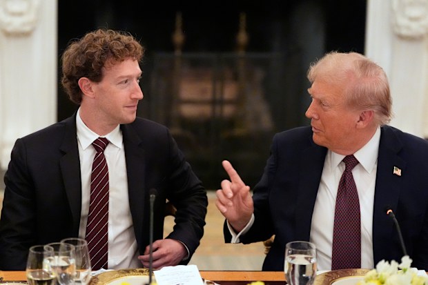 US President Donald Trump speaks as Facebook CEO Mark Zuckerberg listens during a dinner in the State Dining Room of the White House, Thursday, Sept. 4, 2025, in Washington