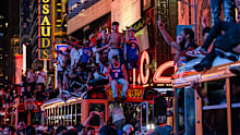 Knicks fans celebrate in New York.