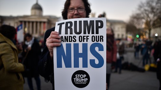 Protesters at a NHS protest at Trafalgar Square during a visit to London by US President Donald Trump