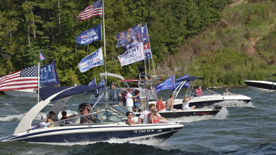 Boat parades, such as this one on Fort Loudon Lake in Tennessee have become a popular method for Americans wishing to demonstrate their support for Donald Trump.