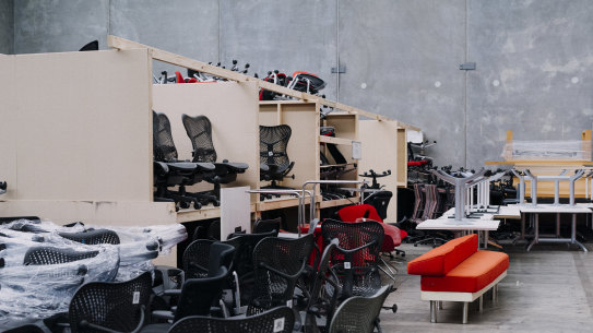 A warehouse filled with unwanted furniture from 500 Bourke Street.