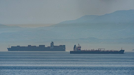 A view of the vessel the Clavel, right, sailing on international waters crossing the Gibraltar stretch. Five Iranian tankers now sailing to Venezuela, part of a wider deal between the two US-sanctioned nations.