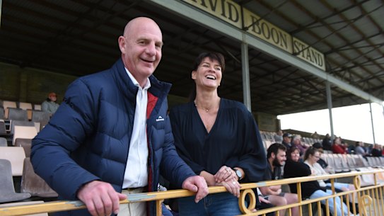 Authentic: Peter Gutwein watches his son playing football from the David Boon Stand in Launceston with his wife Amanda.