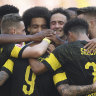 Leaders Dortmund charge on in the Bundesliga