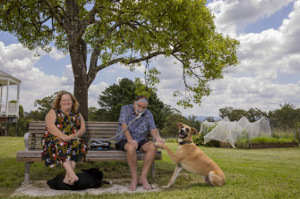 Peter Riley with his wife Beth and family dog Atticus.
