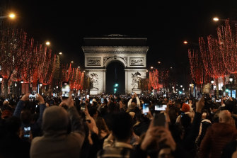 No fireworks but some Parisians bought tickets to see in the new year on the Champs Elysee. 