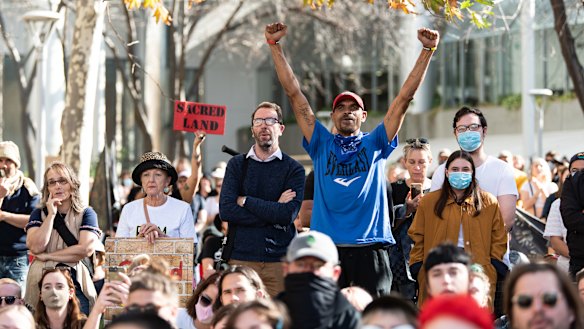 Protesters rally outside Rio Tinto's Perth headquarters. 