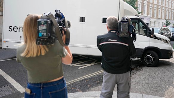 A prison van moves into Westminster Magistrates Court in London for the hearing of a 20-year-old man arrested at Windsor Castle.