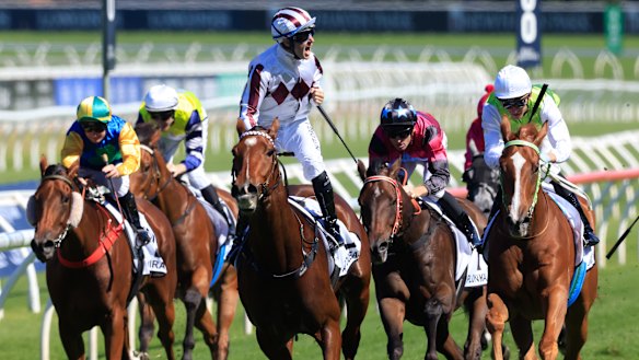 Tommy Berry celebrates aboard Art Cadeau at Randwick on Saturday.
