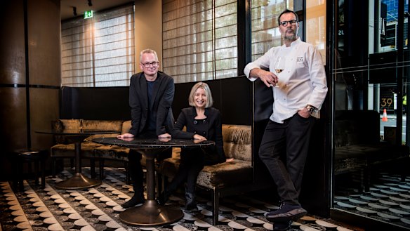 Rodney Setter, left, is suing Vicki Wild and Martin Benn. The three are pictured at Sepia in December 2018.
