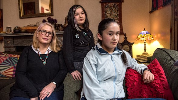 Katherine Wake with her two daughters in her Dulwich Hill home.
