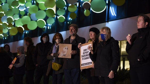 People gathered outside Perth Children’s Hospital for a vigil in support of the Murugappan family.