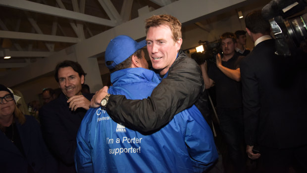 Liberal candidate Christian Porter celebrates his victory in the electorate of Pearce.