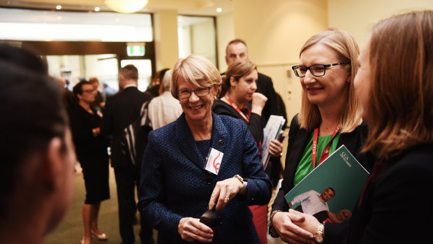 Coca-Cola Amatil chief executive Alison Watkins (left) mixing with shareholders after Wednesday's AGM. 