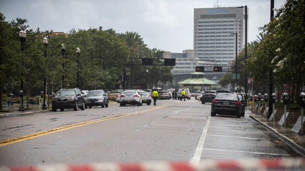 Police barricade a street near Jacksonville Landing in Jacksonville, Florida.