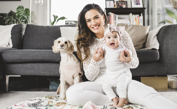 Janette Wojtaszak, with baby Luna and puppy Cookie, is the face of the SurfaceGo's national campaign.