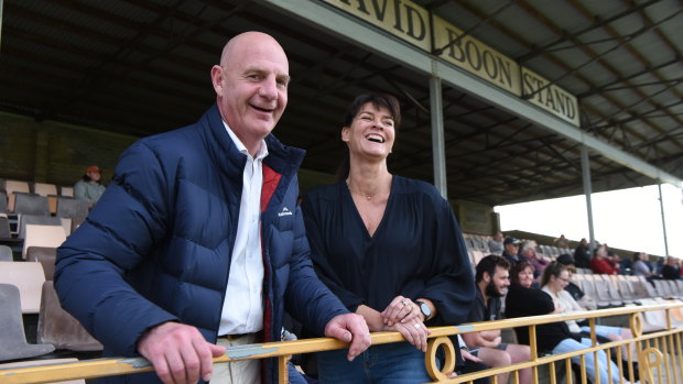 Authentic: Peter Gutwein watches his son playing football from the David Boon Stand in Launceston with his wife Amanda.