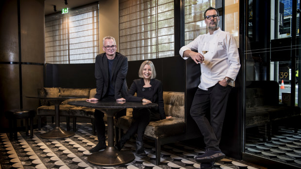 Rodney Setter, left, is suing Vicki Wild and Martin Benn. The three are pictured at Sepia in December 2018.
