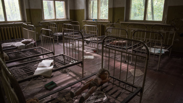 A room inside an abandoned kindergarten and children's home in Zalissya ghost town, located inside the exclusion zone. 