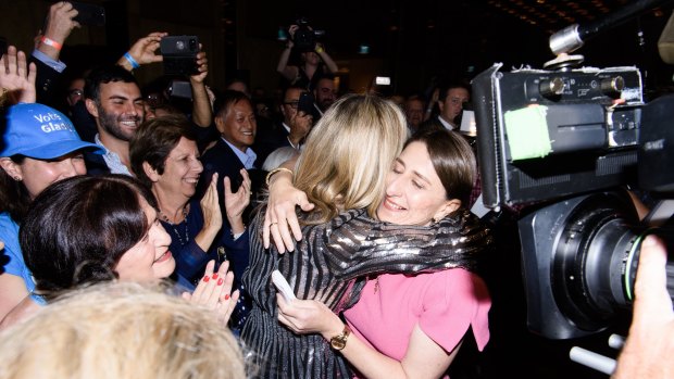 Gladys Berejiklian hugs her sister Mary.