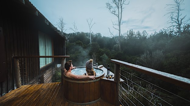 Enjoy a hot tub and cool climate
wine against a backdrop of abundant natural beauty at Tasmania's Cradle Mountain Lodge. 