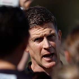 Former St Kilda star and current AFLW coach instructs his charges.