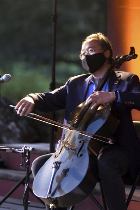 Masked cellist Yo-Yo Ma performs for  a small, invited audience of essential workers in the US in August. 