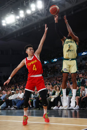 Patty Mills lets a shot fly.