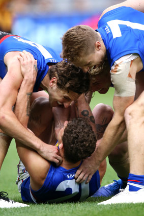 Spiritual leader: Tom Liberatore (centre) is revered by his teammates, says Bulldogs great Bob Murphy.