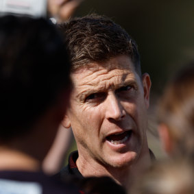 Former St Kilda star and current AFLW coach instructs his charges.