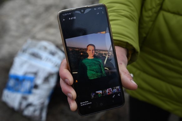 Natalia shows a photo of her 30-year-old son, Serhiy, who was killed by Russian soldiers in Lyman.